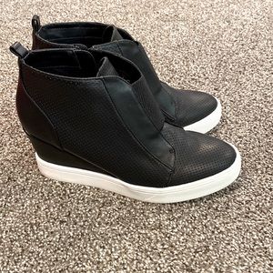Women’s size 8 MIA black wedge bootie.